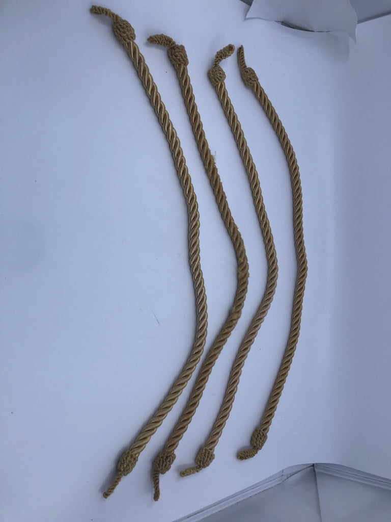 4 GOLD ROPE CURTAIN TIE BACKS.