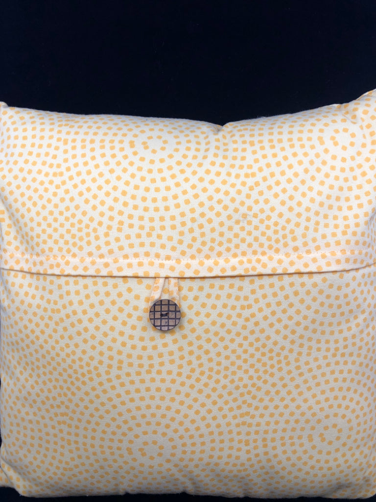 YELLOW W ORANGE DOTS W BUTTON PILLOW.