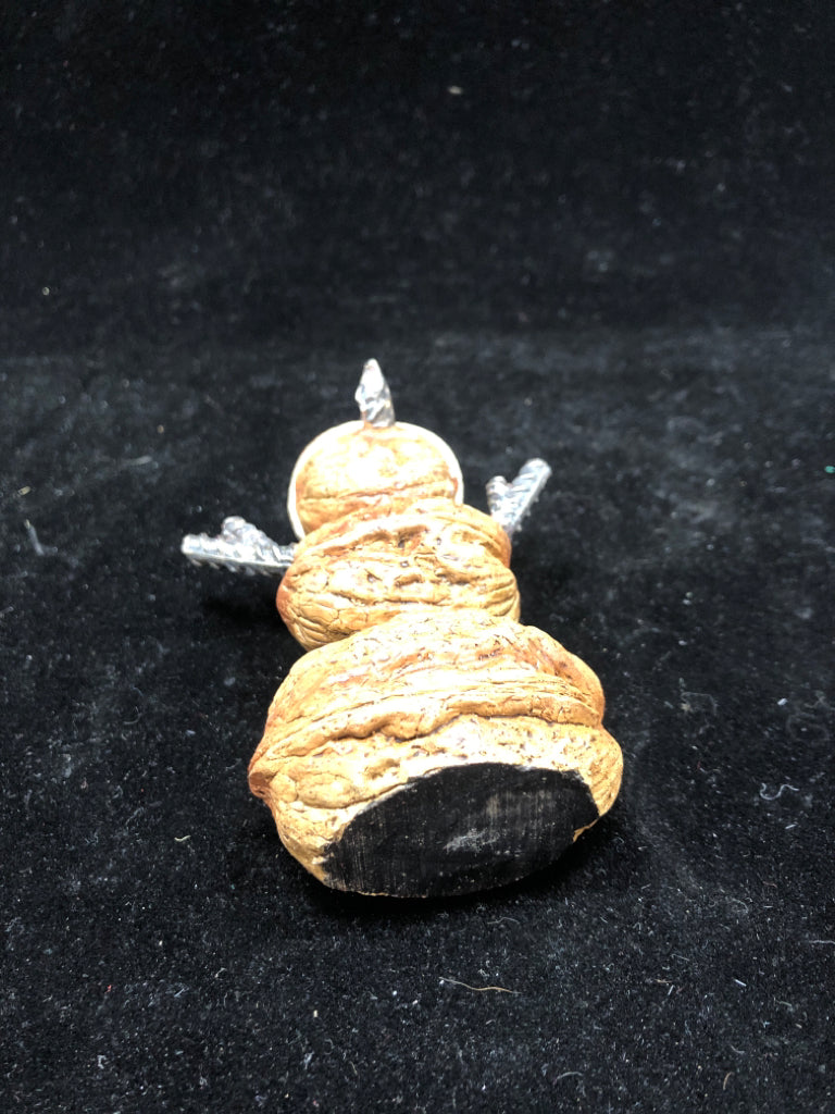CHESTNUT SNOWMAN W/SANTA HAT RESIN FIGURINE.