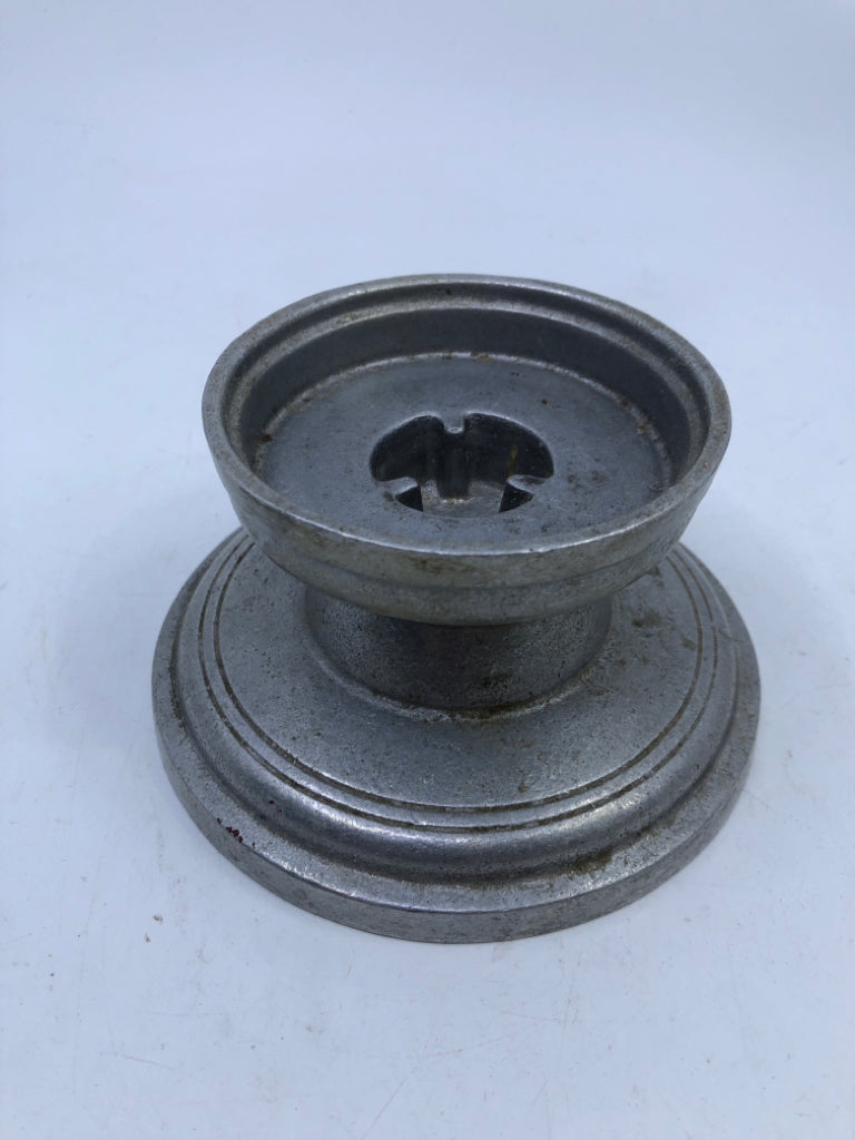 PEWTER BASE TAPERED CANDLE HOLDER W/ GREEN IRIDESCENT GLASS SHADE.
