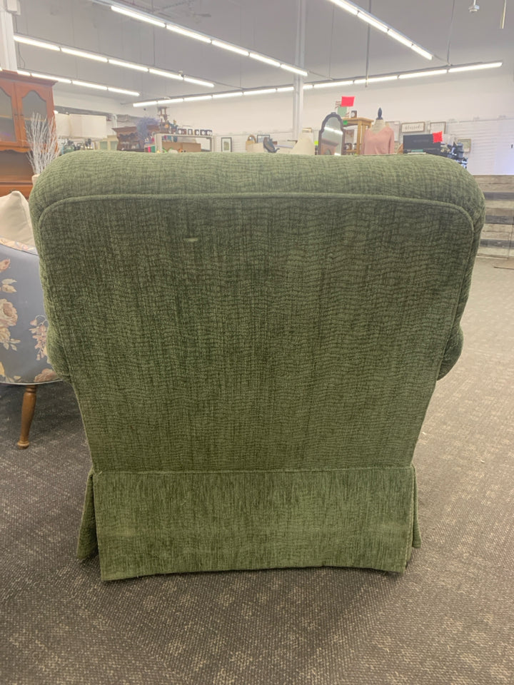GREEN TEXTURED UPHOLSTERED SWIVEL CHAIR.
