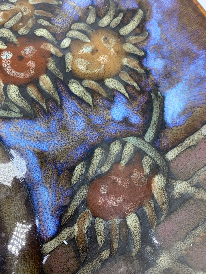 HEAVY BROWN GLAZED CERAMIC PLATE W/FLORAL BOUQUET DESIGN.