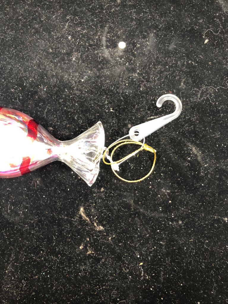 RED STRIPED GLASS CANDY ORNAMENT.