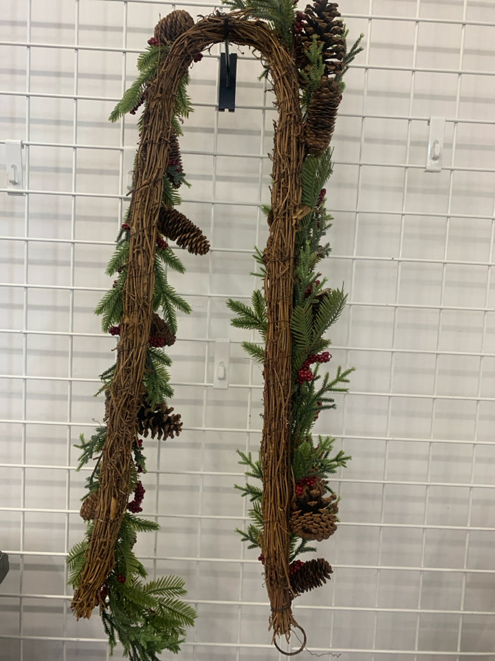 PINECONES AND RED PIP BERRY GARLAND.