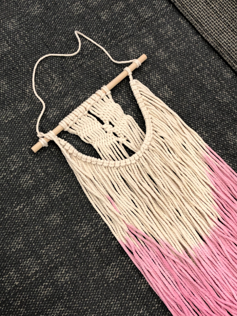 CREAM AND PINK MACRAME WALL HANGING.