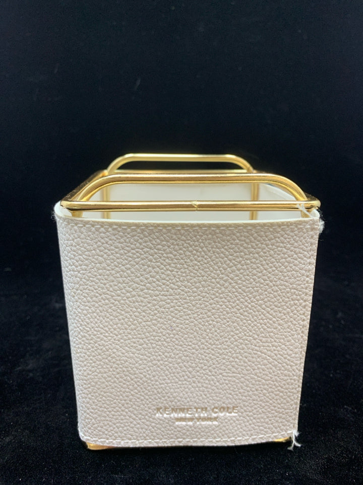 GOLD AND WHITE FAUX LEATHER DESK ORGANIZER.
