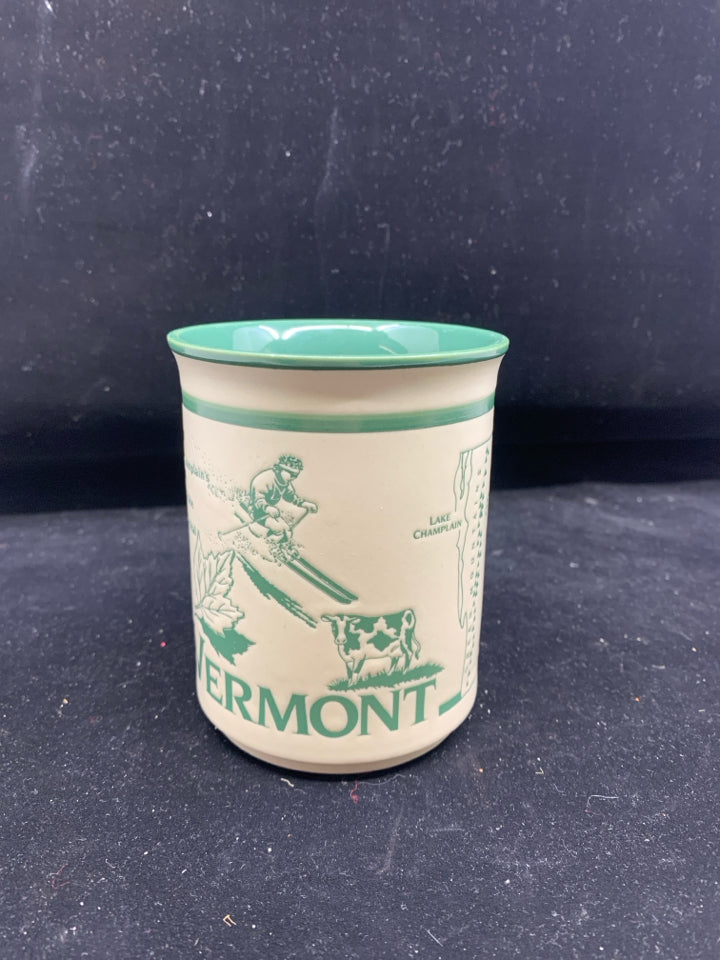 CREAM AND GREEN VERMONT FACTS MUG.