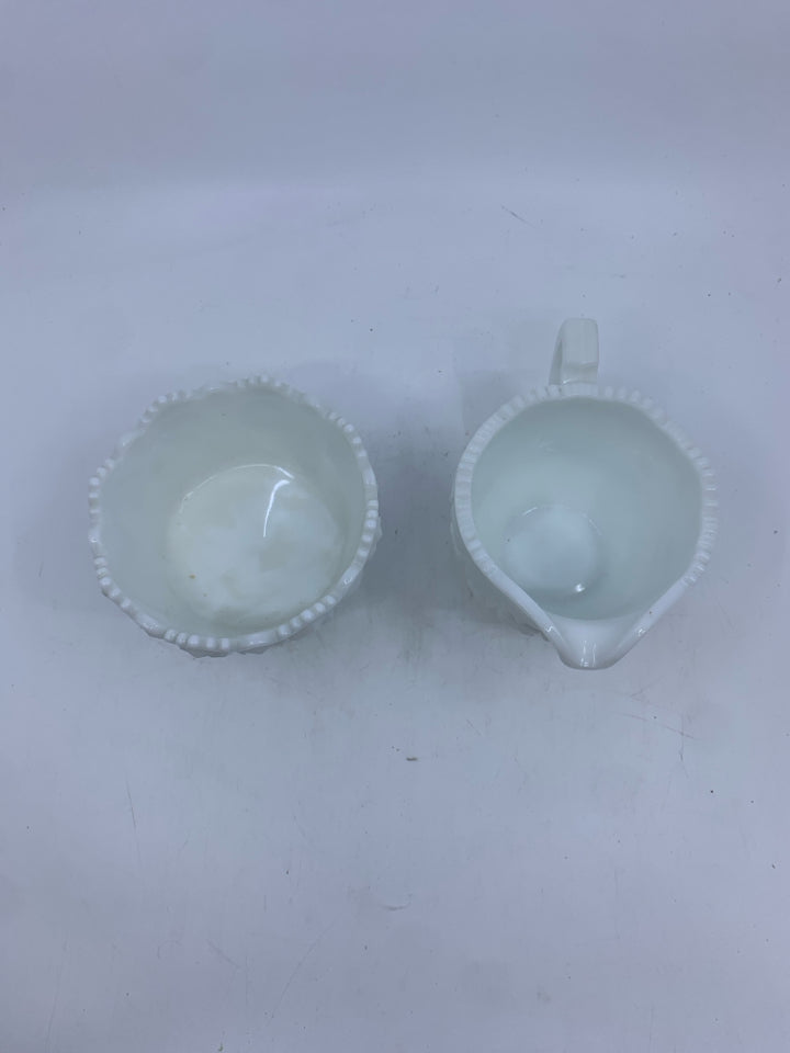 VTG CUT GLASS STAR PATTERN SUGAR AND CREAMER.