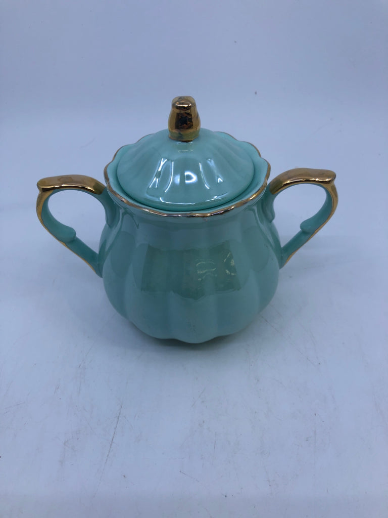 TEAL CERAMIC SUGAR BOWL W/ GOLD DETAILS.