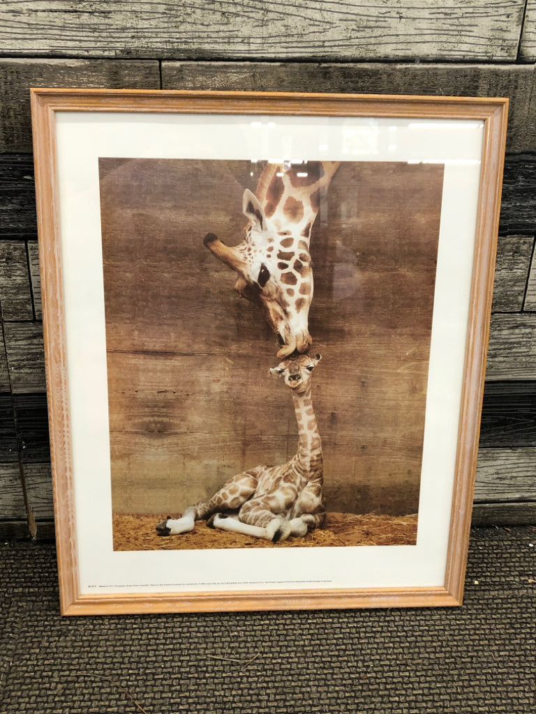 GIRAFFE AND BABY IN TAN FRAME WALL HANGING.