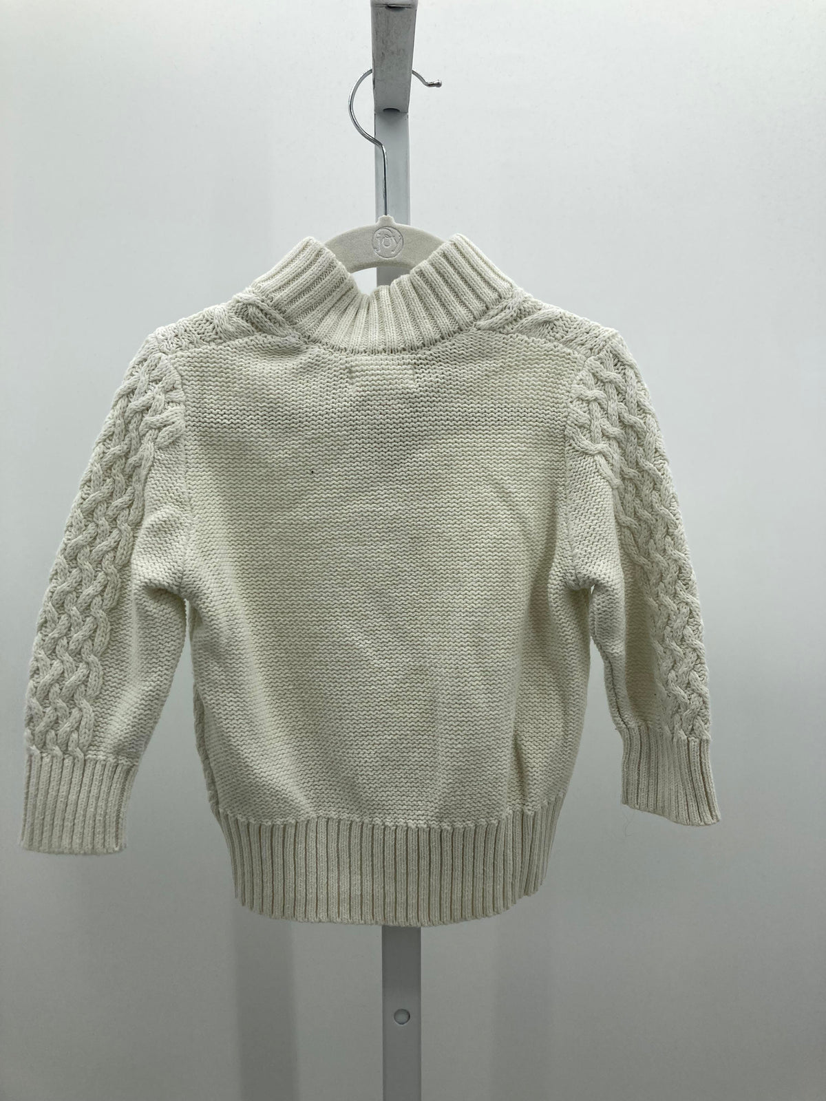 CABLED SWEATER