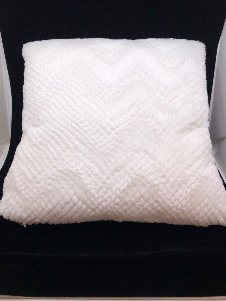 FLUFFY WHITE PILLOW.