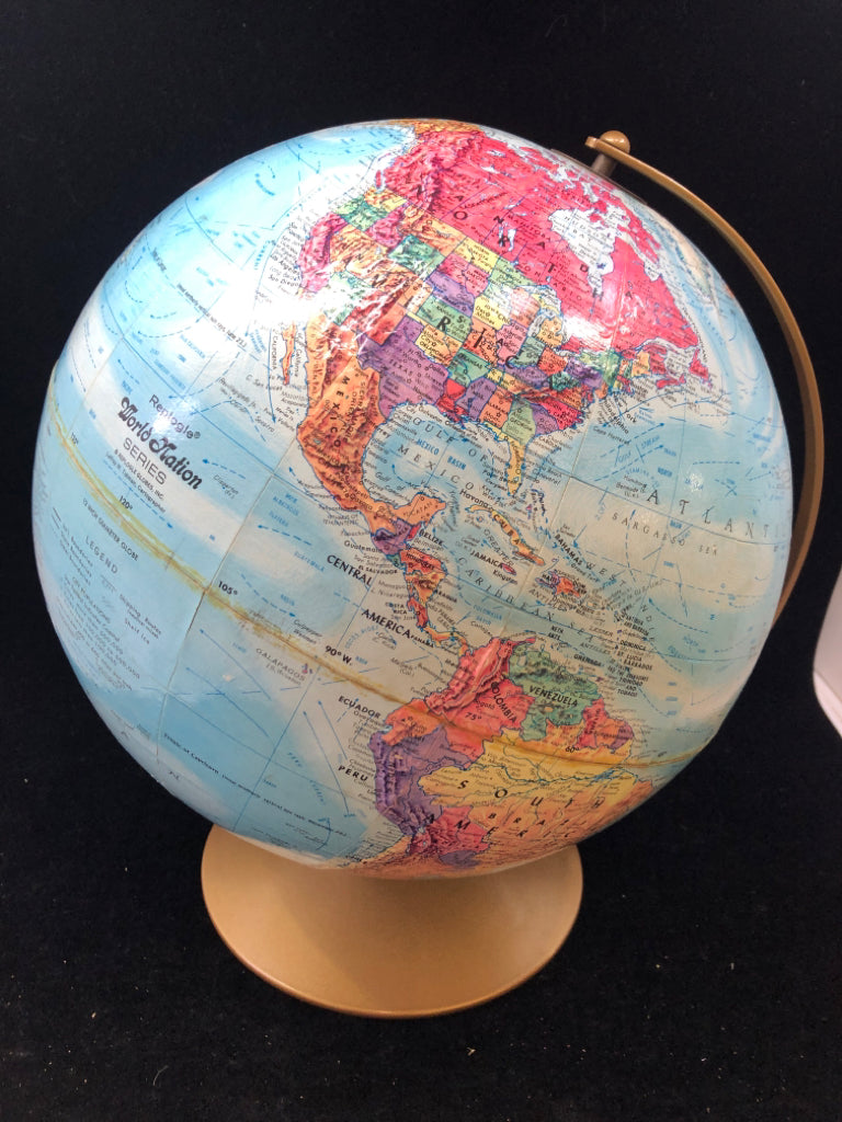 PAPER WORLD GLOBE IN GOLD METAL STAND.