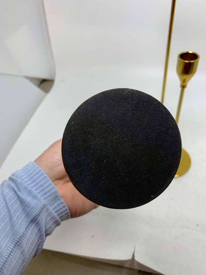 3 GOLD SKINNY TAPERED CANDLE HOLDERS DIFFERENT SIZES.
