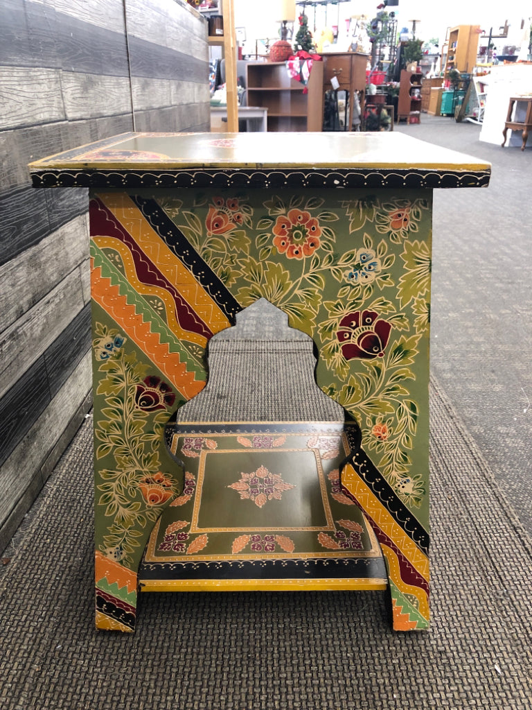 COLORFUL END TABLE W/GREEN TOP & YELLOW BASE & FLORAL LINEWORK.