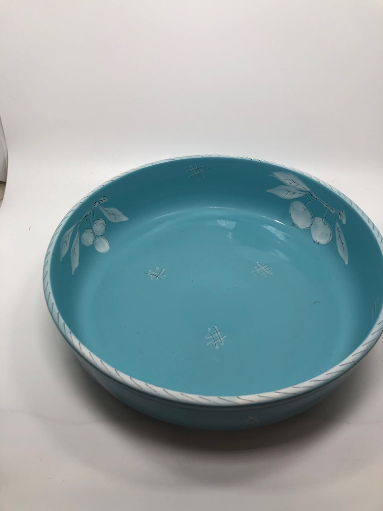 BLUE CERAMIC SERVING BOWL W/WHITE PAINTED FRUITS.