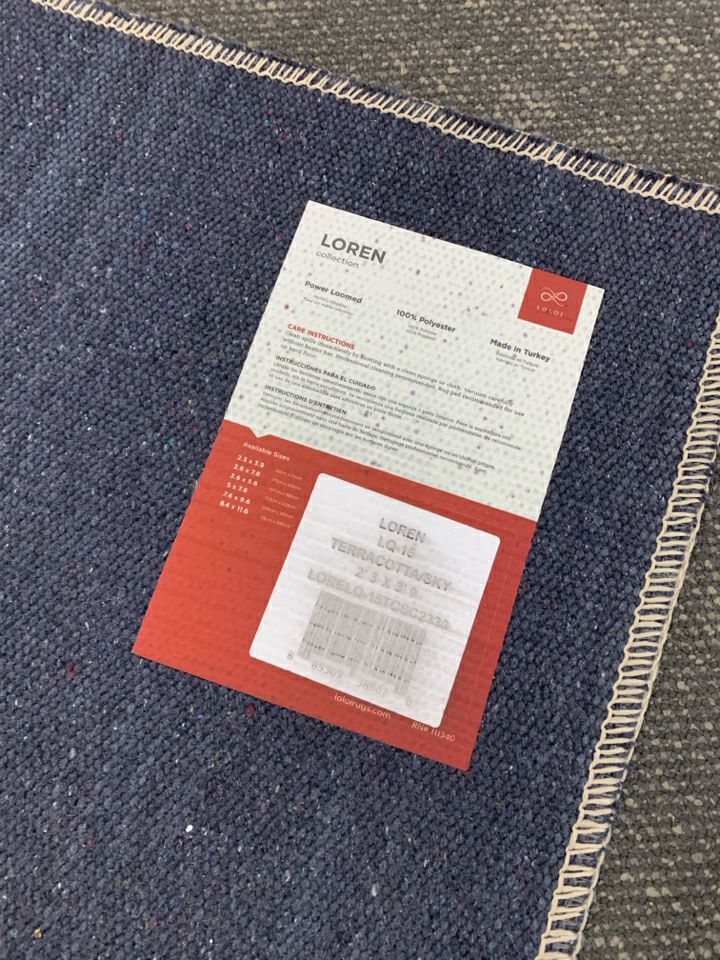 TERRACOTTA/BLUE RUG.