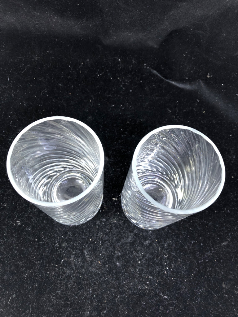 2 SWIRLED CYLINDER CANDLE HOLDERS.