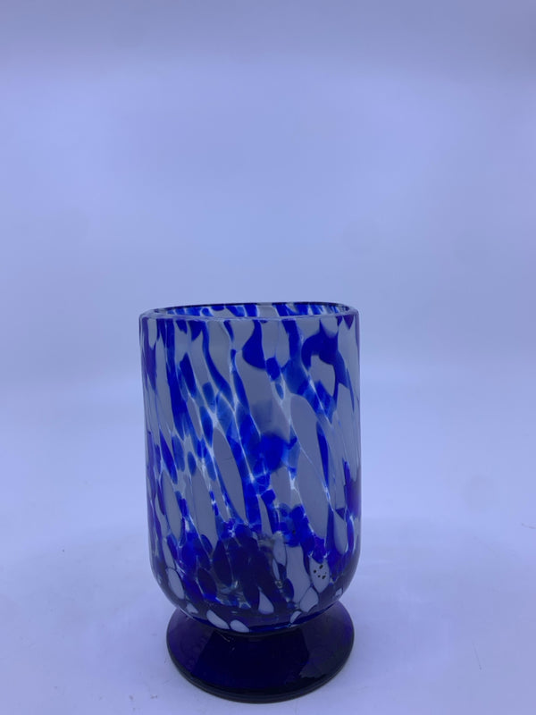 BLUE AND WHITE FOOTED BLOWN GLASS CANDLE HOLDER.