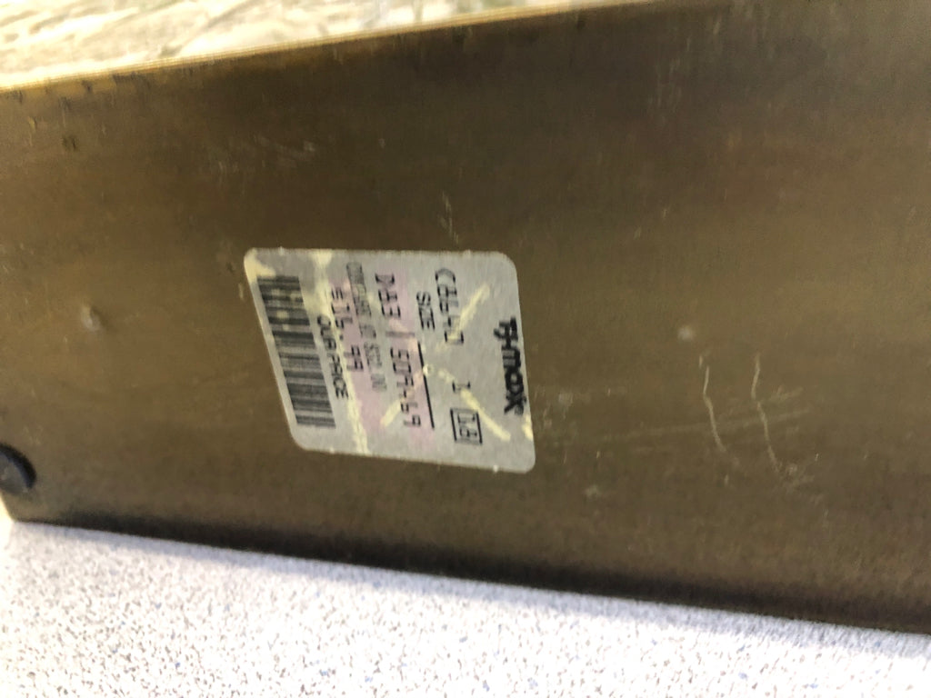 FAUX LAVENDER IN METAL PLANTER.