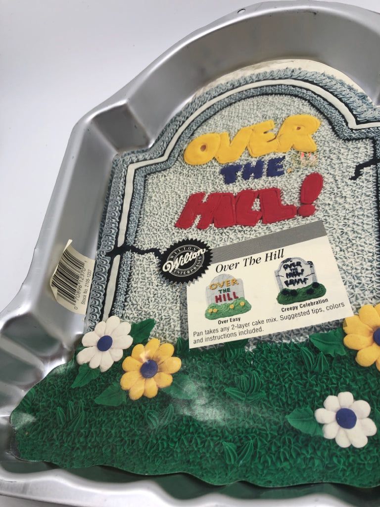 NWT WILTON OVER THE HILL CAKE PAN.