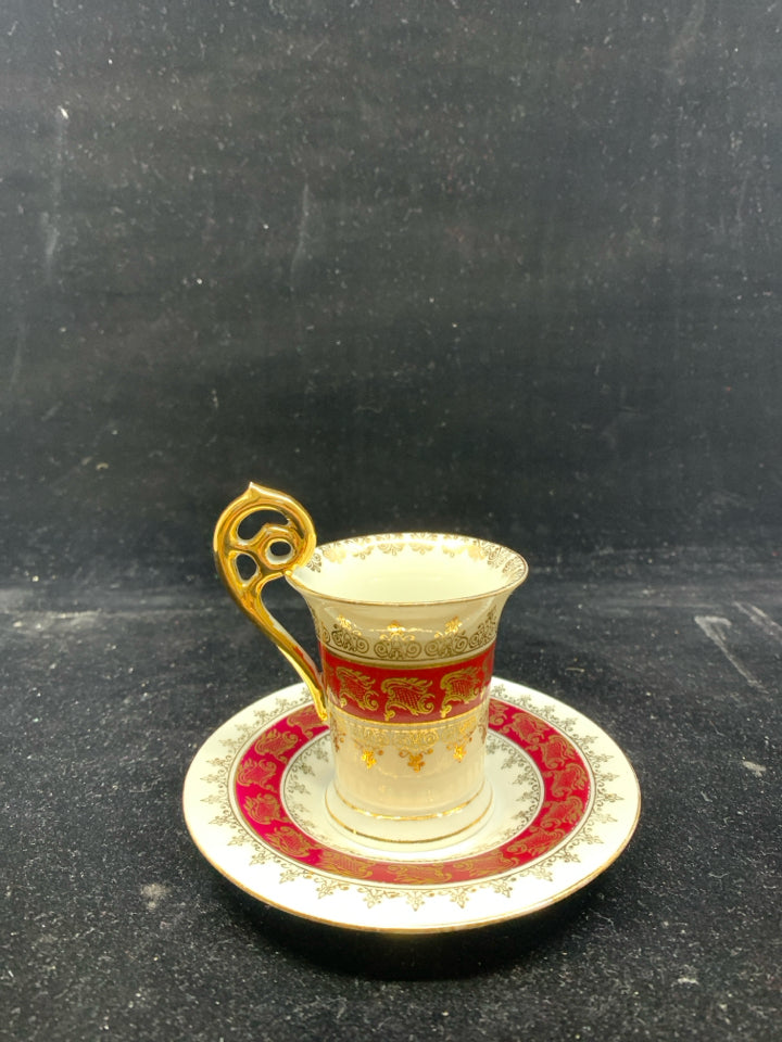 VTG DEMITASSE TEA CUP + SAUCER MAROON W/ GOLD DESIGNS.