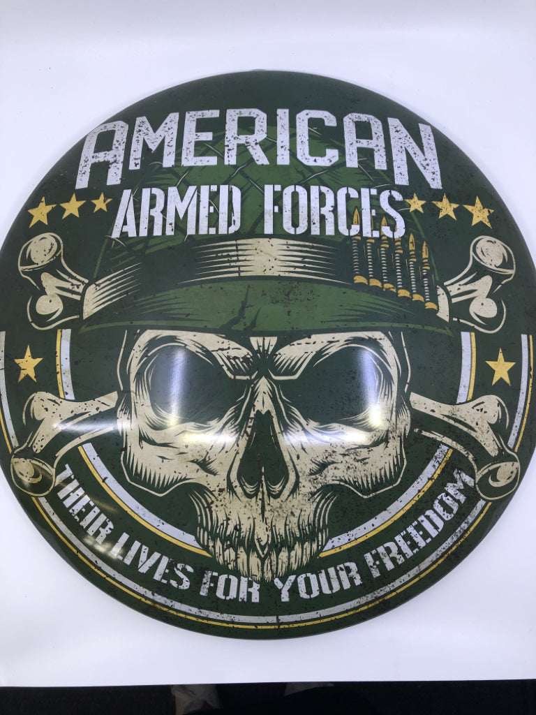 GREEN TIN AMERICAN ARMED FORCES CIRCLE WALL HANGING.