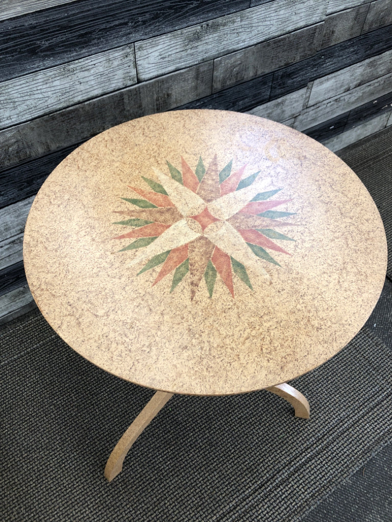 SMALL ROUND VTG TABLE W STAR PATTERN TOP.