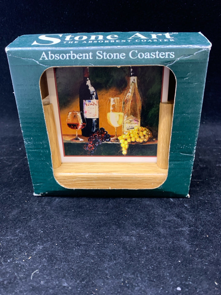 4 NIB WINE BOTTLES STONE COASTERS IN STAND.