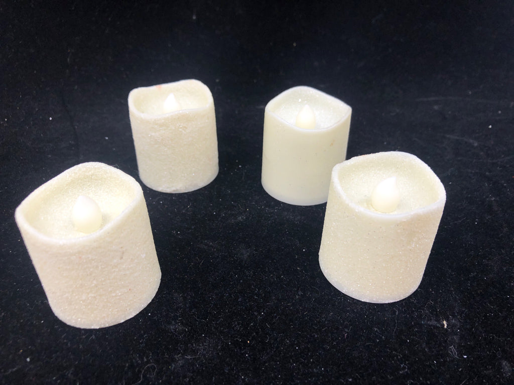 4 GLITTER BATTERY VOTIVES.