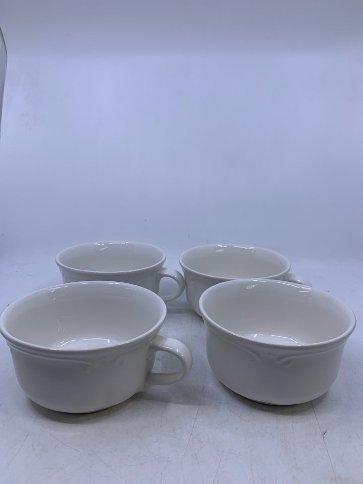 4 OFF WHITE SOUP BOWLS W/ DETAILED EDGE.