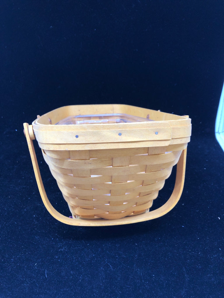 2002 SLANTED BASKET W DIVIDED PLASTIC LINER AND DOUBLE HANDLES.