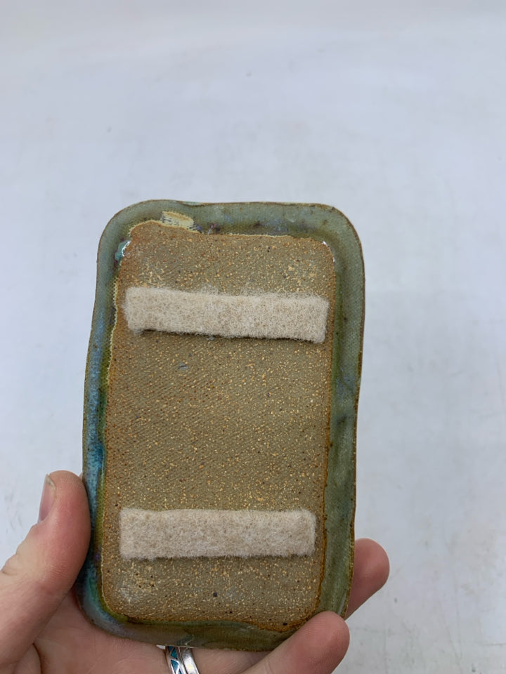 SMALL GREEN W/ EMBOSSED LINES SOAP DISH.