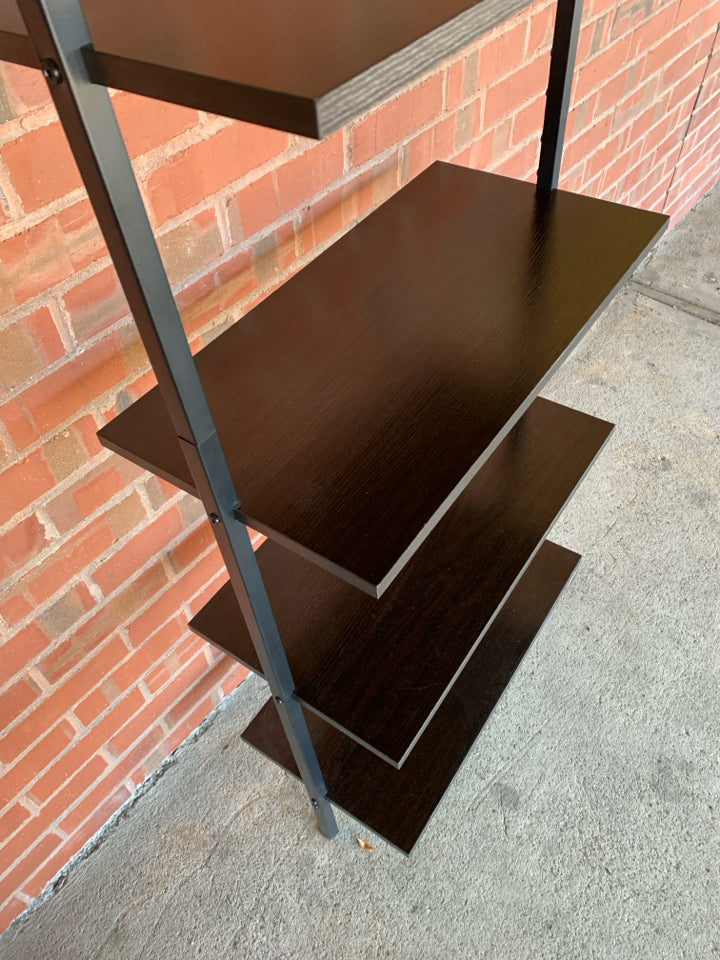 DARK FRAMED LADDER-STYLE WALL-MOUNT BOOKSHELF.