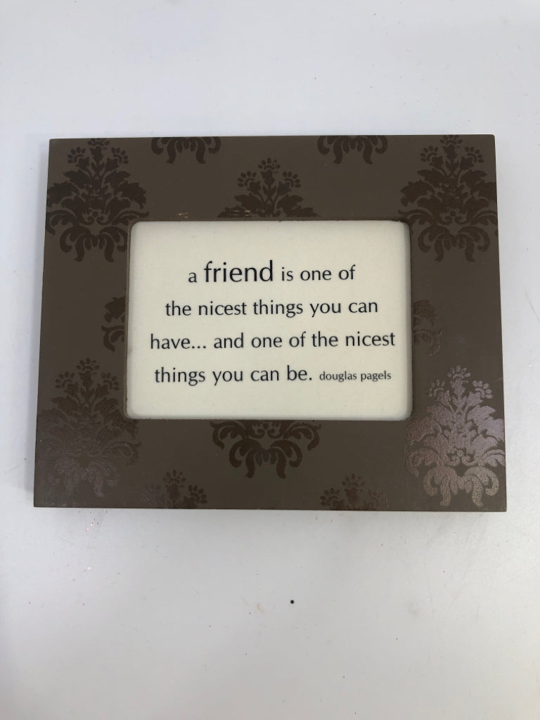 "A FRIEND IS ONE OF THE NICEST" BROWN SCROLL FRAME SIGN.