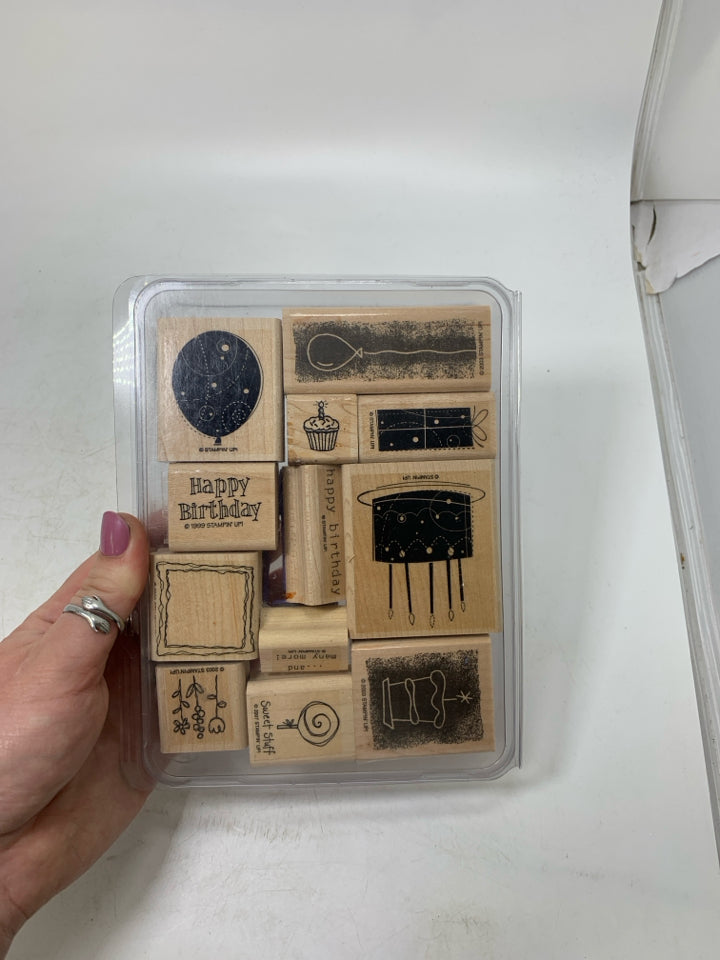 STAMPS IN CASE.