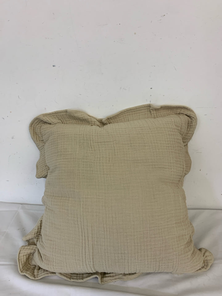 TAN RUFFLED EDGE SQUARE PILLOW.