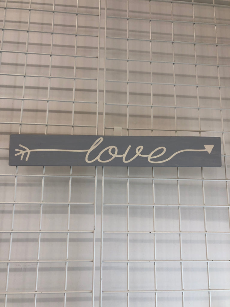 BLUE "LOVE" PAINTED WOOD SIGN.