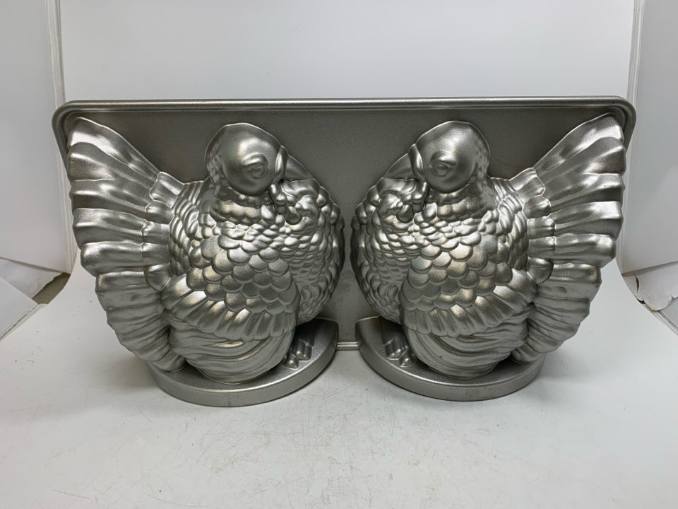 NORDIC WARE TURKEY CAKE PAN.