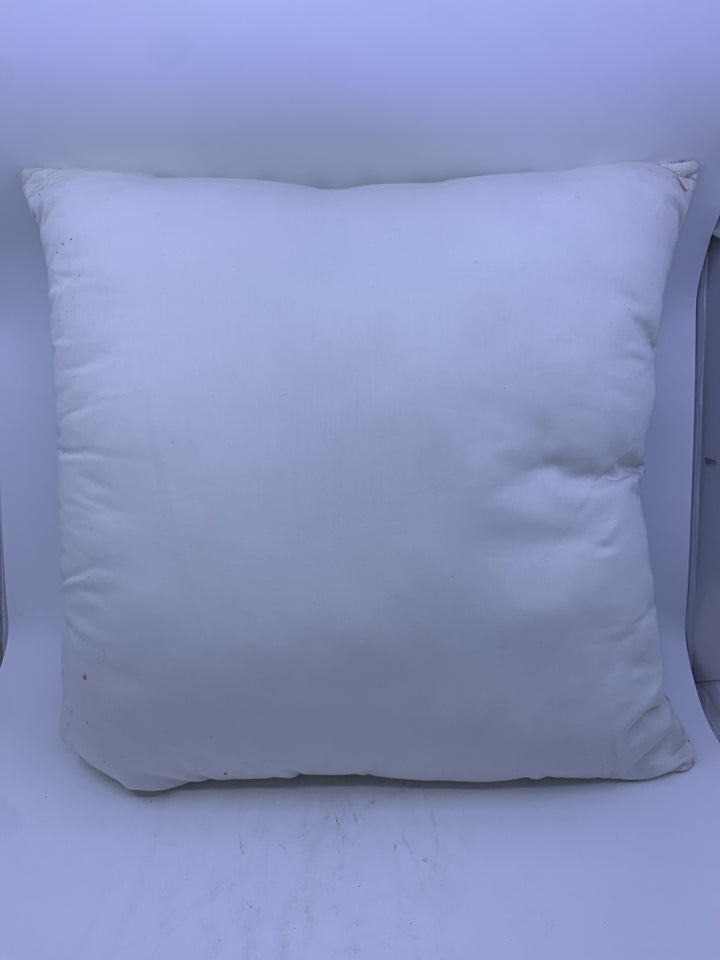 WHITE AND SILVER PATTERN PILLOW.