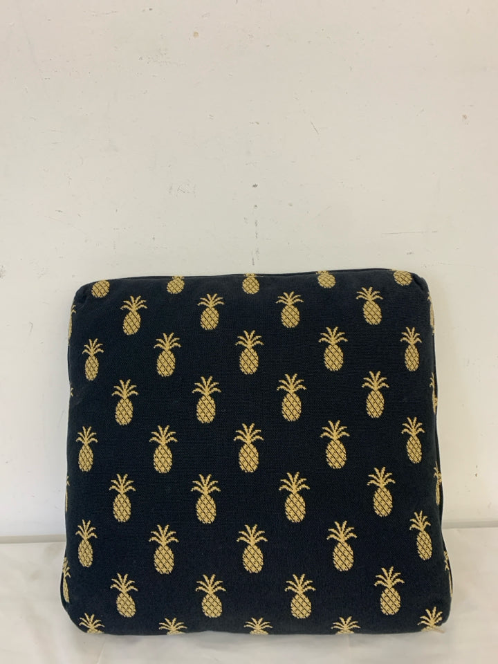 SQUARE BLACK PILLOW W/ PINEAPPLES.