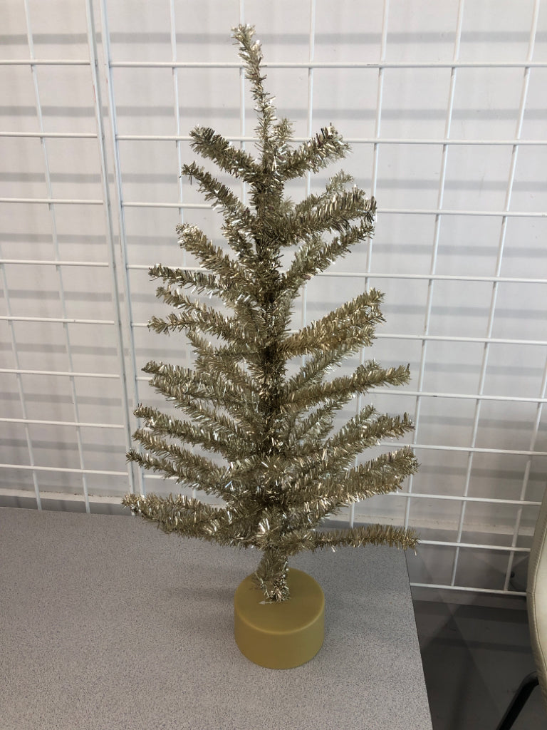 GOLD TINSEL TREE.
