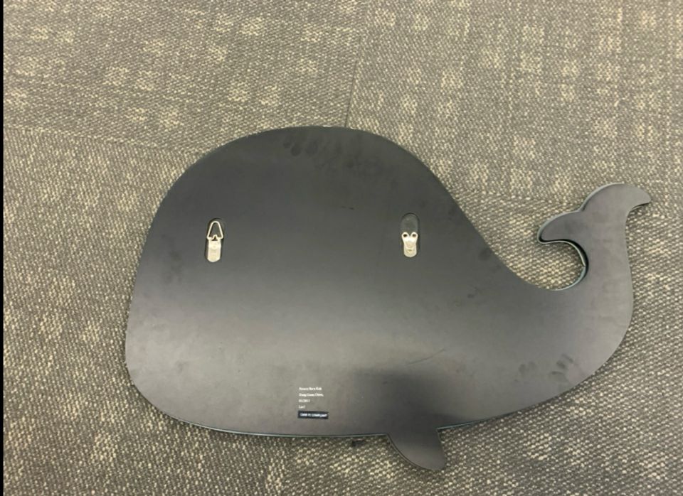 LARGE WHALE SHAPED MIRROR.