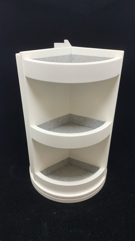 ROTATING GRAY FABRIC JEWELRY HOLDER.