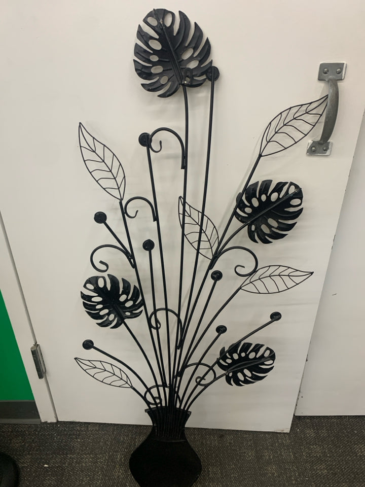 METAL LEAVES AND POT W/JEWELS WALL HANGING.