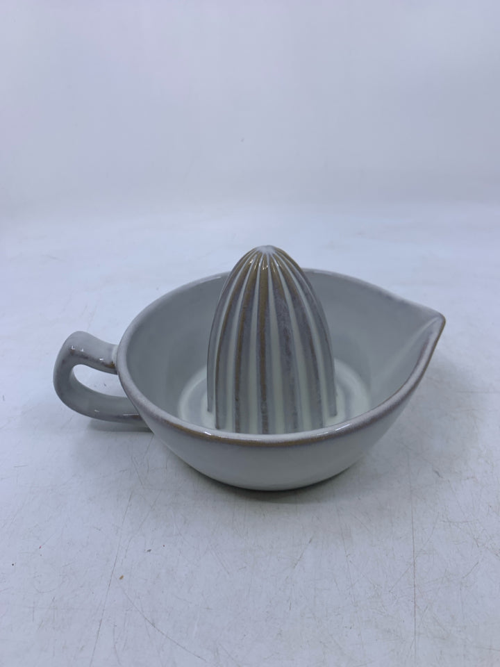 WHITE GLAZED CITRUS STONEWARE JUICER.