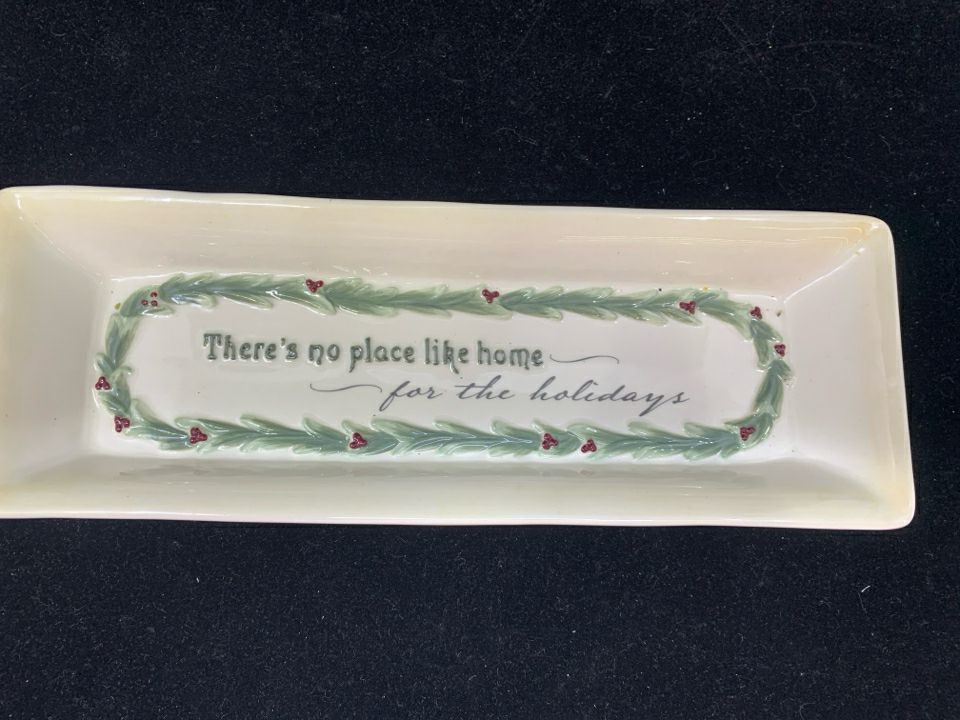 THERE'S NO PLACE LIKE HOME- W HOLLY DISH.