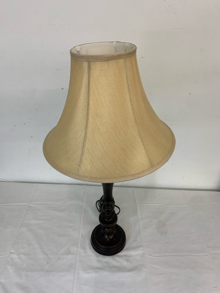 SKINNY BROWN BASE LAMP W TAN SHADE.