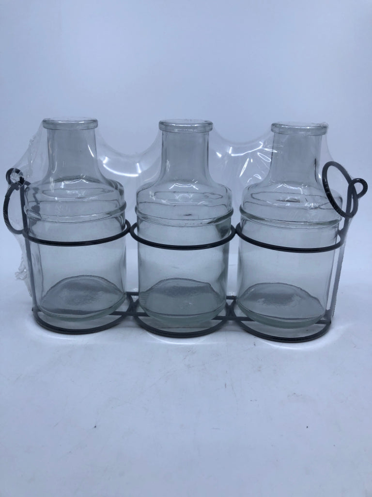 NIP GLASS BOTTLES IN METAL DECOR.