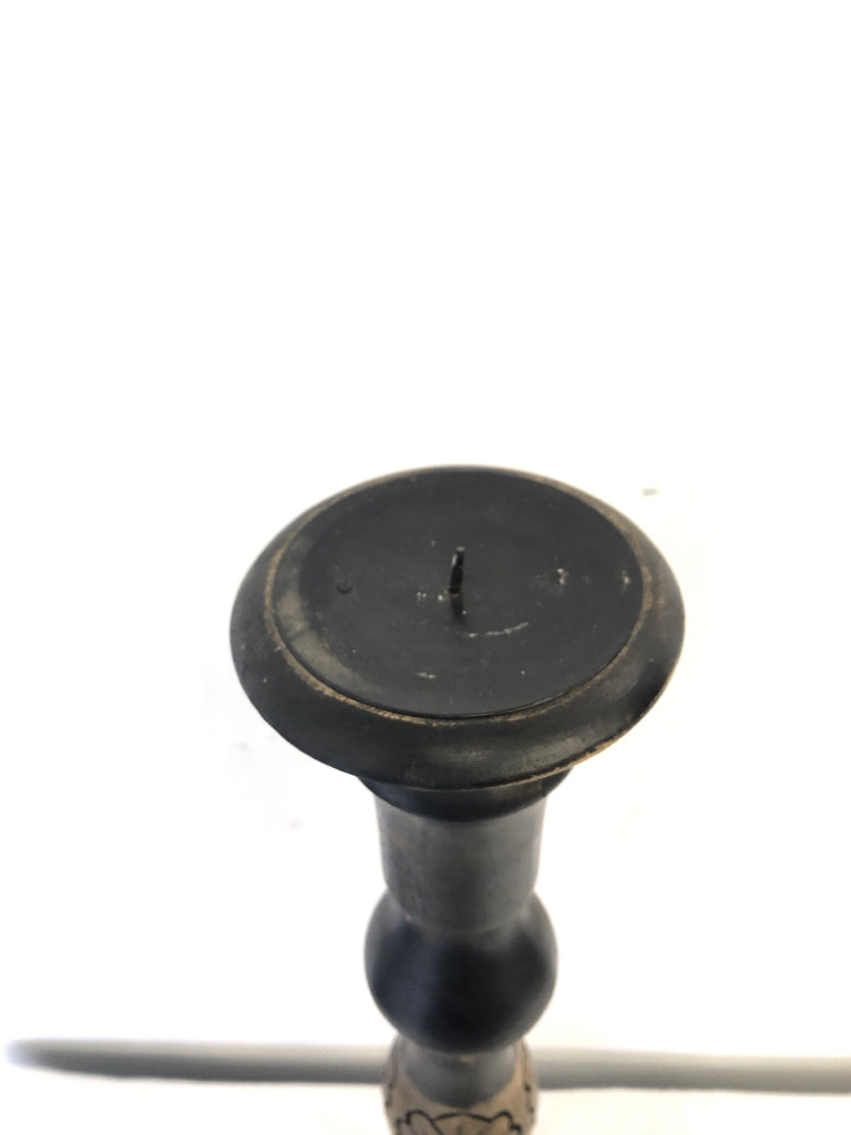 BLACK DISTRESSED CARVED PILLAR CANDLE HOLDER.